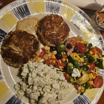 Coastal Flats - Crab cakes Cole slaw and tomato cucumber salad - American Near Me - Gaithersburg, Maryland Coastal Flats - Crab cakes Cole slaw and tomato cucumber salad - American Near Me - Gaithersburg, Maryland