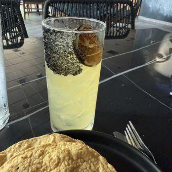 La Mala Mexican Inspired Cocktails - Black salt on the rim of my Mezcalita. - Cocktail Bars Near Me - Durham, North Carolina