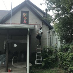 Elemental Studio - Custom art install in St. Anne's Hill neighborhood. Master copy window covering.