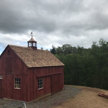 Esensten Construction & Home Services - Timber frame barn with cedar shake roof and lighted cupola - General Contractors Near Me Esensten Construction & Home Services - Timber frame barn with cedar shake roof and lighted cupola - General Contractors Near Me