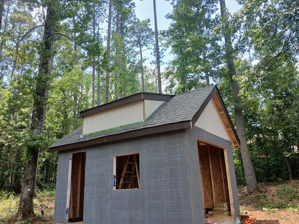 Slide of YLS Lopez Roofing Solutions