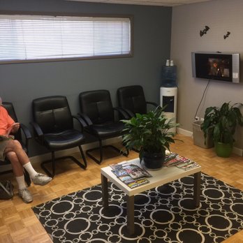 La Mesa Spine Center - Cozy waiting area with TV and cold water. - Chiropractors Near Me - La Mesa, California La Mesa Spine Center - Cozy waiting area with TV and cold water. - Chiropractors Near Me - La Mesa, California