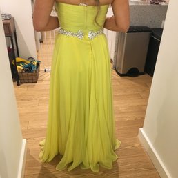 The back of the dress that was ruined by Silhouettes and Profiles. The back of the dress that was ruined by Silhouettes and Profiles.