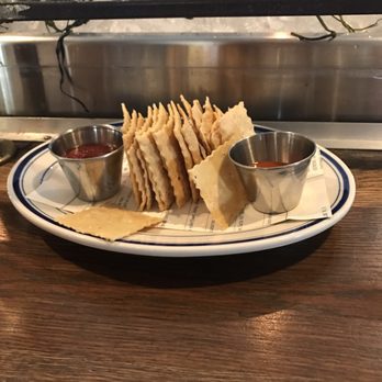 The Optimist - Homemade crackers with hot sauce and thick cocktail sauce. - Seafood Near Me - Atlanta, Georgia The Optimist - Homemade crackers with hot sauce and thick cocktail sauce. - Seafood Near Me - Atlanta, Georgia
