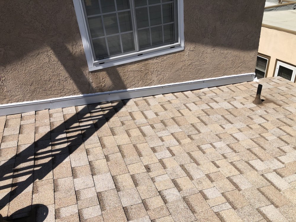 Slide of Martinez Roofing