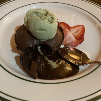 Le Monde - Chocolate cookie with pistachio ice cream - French Near Me - New York, New York Le Monde - Chocolate cookie with pistachio ice cream - French Near Me - New York, New York