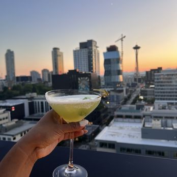 Altitude Sky Lounge - South lake split cocktail during sunset - Lounges Near Me - Seattle, Washington