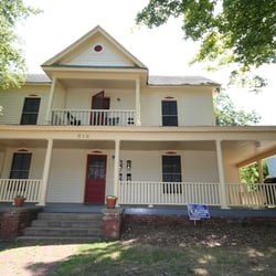 Bob Schmitz Properties - Gorgeous home broken up into four 1BR Apartments only 1 Block to East Campus in Trinity Heights