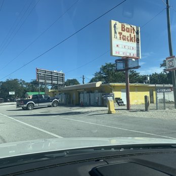 The Yellow Bait House - a car parked in front of it - Seafood Near Me - Key Largo, Florida