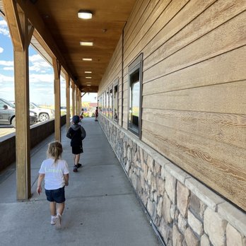 Pizza Ranch - two children walking down the sidewalk - Pizza Near Me - Casper, Wyoming Pizza Ranch - two children walking down the sidewalk - Pizza Near Me - Casper, Wyoming