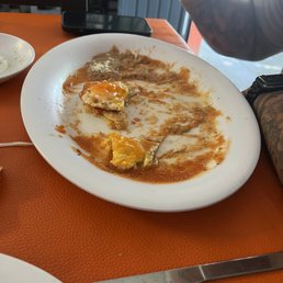 Almost finished huevos rancheros.