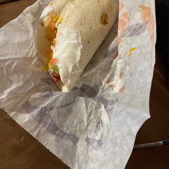 Taco Bell - No kind of effort not to throw sour cream literally everywhere all over the outside of taco and wrapper??? - Fast Food Near Me - Grand Haven, Michigan Taco Bell - No kind of effort not to throw sour cream literally everywhere all over the outside of taco and wrapper??? - Fast Food Near Me - Grand Haven, Michigan