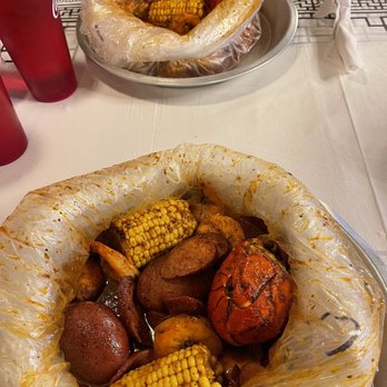 The Tasty Crab - Sea food boil with: Lobster tail, shrimp, sausage, corn, and potatoes I had it made with Cajun seasoning, mild. - Cajun/Creole Near Me - Bloomington, Illinois The Tasty Crab - Sea food boil with: Lobster tail, shrimp, sausage, corn, and potatoes I had it made with Cajun seasoning, mild. - Cajun/Creole Near Me - Bloomington, Illinois