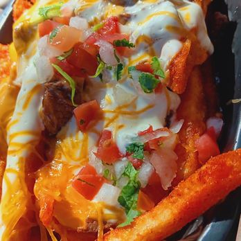 Taco Bell - $5.49 Steak Garlic Nacho Fries (under the Specialties menu) - Fast Food Near Me - Rohnert Park, California Taco Bell - $5.49 Steak Garlic Nacho Fries (under the Specialties menu) - Fast Food Near Me - Rohnert Park, California