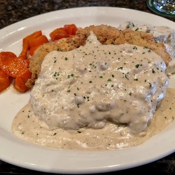 Charleston's - Chicken fried steak, garlic mashed potatoes, glazed carrots - American Near Me - Oklahoma City, Oklahoma