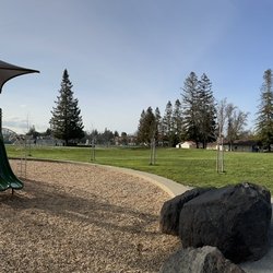 Wilson Park - Panoramic view of older kid playground and field area