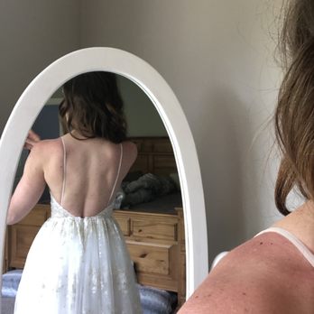 April Alterations, Bridal Sewing - The back? What happened it lost all the design and is 1/2 way up my back and you can see how to goes up vs a vback - Sewing & Alterations Near Me - Maple Grove, Minnesota