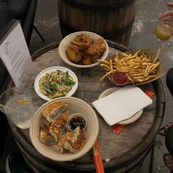 Dumpling Up - Cucumber salad, fried chicken, pork dumpling, fries