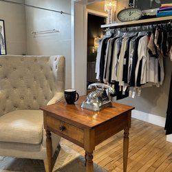 Simply J Boutique - Sitting area and fitting rooms behind