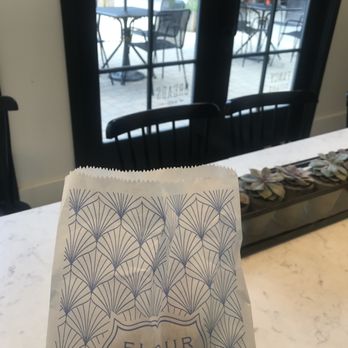 Flour Craft Bakery - blackberry scone in the bag, showcasing the cute table inside and outdoor seating area - Bakeries Near Me - Mill Valley, California Flour Craft Bakery - blackberry scone in the bag, showcasing the cute table inside and outdoor seating area - Bakeries Near Me - Mill Valley, California