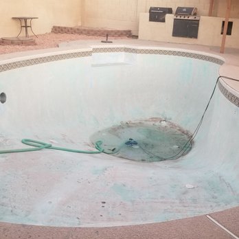 Arizona Pool Remodeling & Service - Empty pool with very old pop ups and tile. Deck was stained and unleveled in some areas. - Pool Cleaners Near Me Arizona Pool Remodeling & Service - Empty pool with very old pop ups and tile. Deck was stained and unleveled in some areas. - Pool Cleaners Near Me