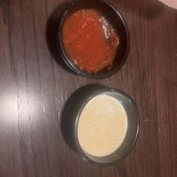 Dos Hermanos Mexican Grill & Bar - Salsa and white dip we didn't use