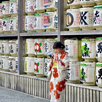 Supera Tours - East meets west, young japanese girl in her kimono checking her mobile phone at the Tsurugaoko Hachimangu shrine. - Historical Tours Near Me - South El Monte, California Supera Tours - East meets west, young japanese girl in her kimono checking her mobile phone at the Tsurugaoko Hachimangu shrine. - Historical Tours Near Me - South El Monte, California