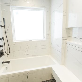 MDC Contracting Corp - a bathtub and shower in a bathroom - General Contractors Near Me - Brooklyn, New York