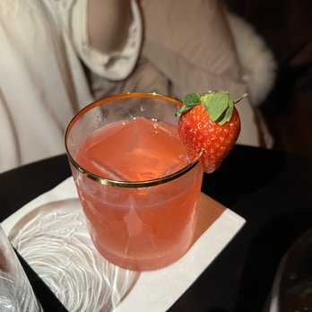 The Junto Attic Bar - a strawberry and a drink - Speakeasies Near Me - Jersey City, New Jersey