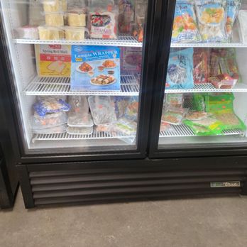 We Mehm Asian Market - two refrigerators filled with food - International Grocery Near Me - Jacksonville, North Carolina