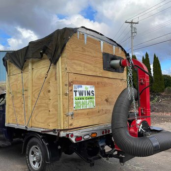 Twins Lawn Care - a truck with a wood box on the back - Lawn Services Near Me Twins Lawn Care - a truck with a wood box on the back - Lawn Services Near Me