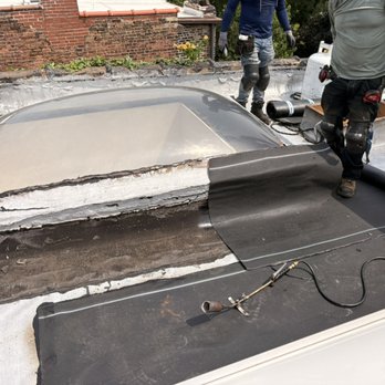 Encore Roofing and Masonry - Emergency repair around skylight using modified rubber bitamin - Roofing Near Me - Chicago, Illinois Encore Roofing and Masonry - Emergency repair around skylight using modified rubber bitamin - Roofing Near Me - Chicago, Illinois
