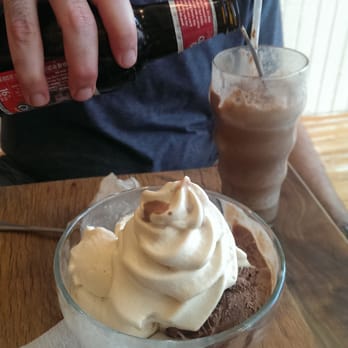 The Parlour - Cherry bomb float and chocolate/salted butter caramel ice cream in dish topped with coffee cream - Ice Cream & Frozen Yogurt Near Me - Durham, North Carolina The Parlour - Cherry bomb float and chocolate/salted butter caramel ice cream in dish topped with coffee cream - Ice Cream & Frozen Yogurt Near Me - Durham, North Carolina