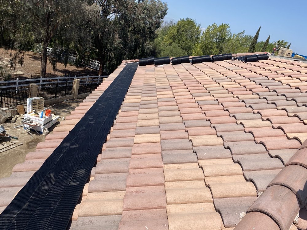 Slide of Pool Solar and Roofing