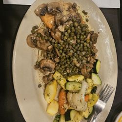 Vincenzo's Ristorante - Salmon dish that was phenomenal. I added capers and boy did they add capers!