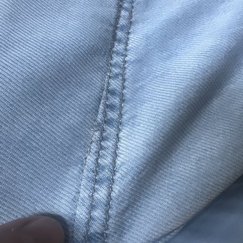 Laces and Pearls - Their stitching is the line closest to my finger - Sewing & Alterations Near Me - Kelowna, British Columbia Laces and Pearls - Their stitching is the line closest to my finger - Sewing & Alterations Near Me - Kelowna, British Columbia