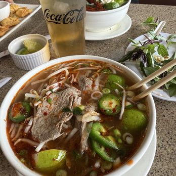 Pho Mai - Pho all dressed up with additives (after tasting the broth first of course) I love mine to be spicy so I put a lot of spice! - Vietnamese Near Me - San Bernardino, California Pho Mai - Pho all dressed up with additives (after tasting the broth first of course) I love mine to be spicy so I put a lot of spice! - Vietnamese Near Me - San Bernardino, California