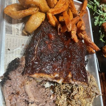 Whiskey 'N Rye Smokehouse - Trio sampler ribs, smoked brisket and pulled pork, sides sweet potato fries and onion rings. - Barbeque Near Me - Solvang, California Whiskey 'N Rye Smokehouse - Trio sampler ribs, smoked brisket and pulled pork, sides sweet potato fries and onion rings. - Barbeque Near Me - Solvang, California