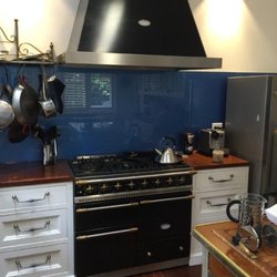 Malcolm St James - French Provincial Solid Timber Kitchen with Black Lacanche  Stove and matching RangeHood