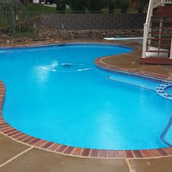 A pool we designed a custom safety cover for.