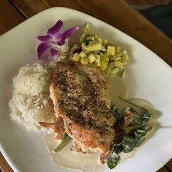 Tree Tops Restaurant - Chicken florentine with grilled chicken with creamy spinach, sun dried tomatoes, rice, and vegetables - New American Near Me - Acme, Pennsylvania