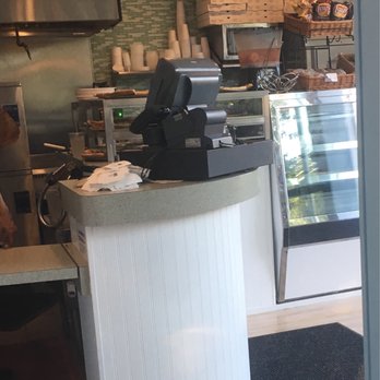 Pines Pizza - a man working behind a counter - Pizza Near Me - Sayville, New York Pines Pizza - a man working behind a counter - Pizza Near Me - Sayville, New York