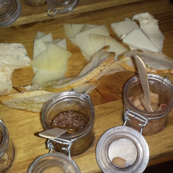 Jennifer's Catering - Farmstead cheese board: Cambozola, manchego, gouda (?), & P'tit Basque, with almond slivers, tapenade, & apple/wine compote. - Caterers Near Me - Phoenix, Arizona