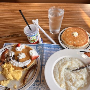 IHOP - A happy face pancake combo sweet tea grits water no ice gluten-free pancake - American Near Me - Bethlehem, Georgia IHOP - A happy face pancake combo sweet tea grits water no ice gluten-free pancake - American Near Me - Bethlehem, Georgia