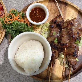Andaman Asian Cuisine - Charcoal Grilled Pork with Side Sticky Rice - Thai Near Me - St. Augustine, Florida Andaman Asian Cuisine - Charcoal Grilled Pork with Side Sticky Rice - Thai Near Me - St. Augustine, Florida