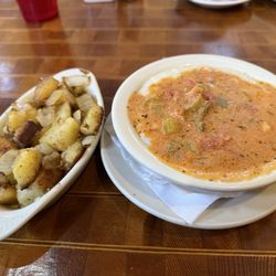 Mande's Restaurant - Hone fries & grits with etouffee