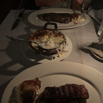 Maple & Ash - Top: 32 Day Dry-Aged Bone-In New York Strip; Bottom: Takamori Drunken Wagyu - Steakhouses Near Me - Chicago, Illinois