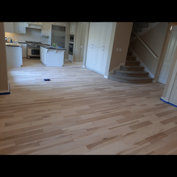 Zet flooring - a view of a living room and kitchen - Flooring Near Me Zet flooring - a view of a living room and kitchen - Flooring Near Me
