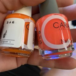 World Nail Bar - Nail polish colors that the lady said were "similar" but their 2 totally different colors one is orange one is pinkish