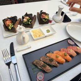 happy hour hand rolls: salmon, spicy scallop and toro! so good nigiri: wagyu, salmon & toro